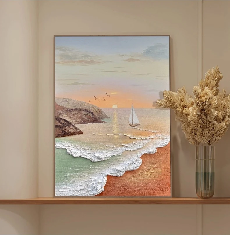 Coastal sailboat wall art shown in a styled room setting